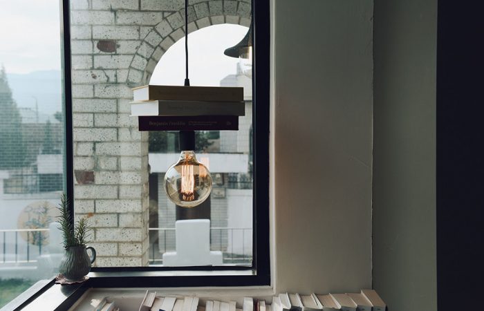 Books on top of light feature