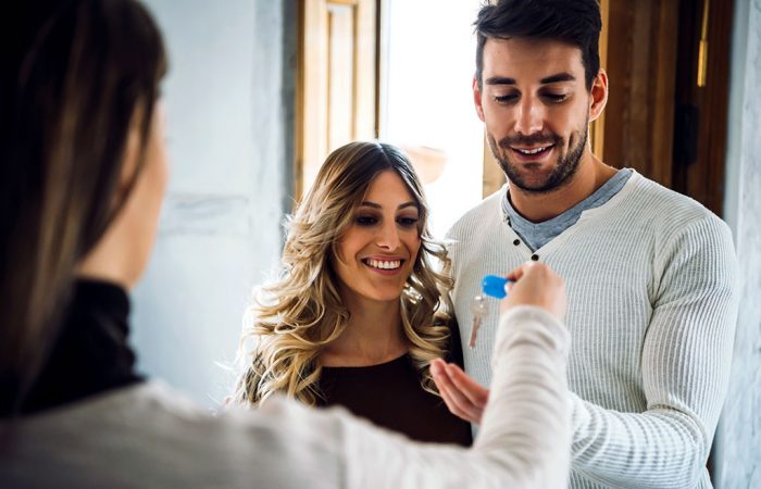 Couple recieving keys