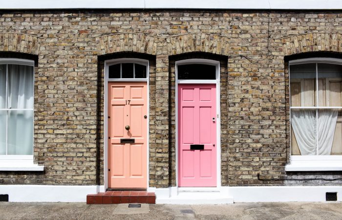 Two front doors on suburban street